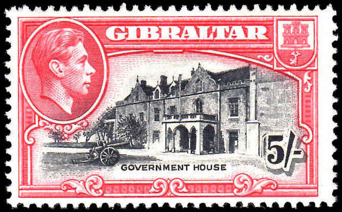 Gibraltar 1944 5/- black & carmine perf 13 mint very lightly hinged.