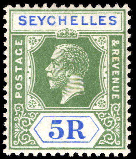 Seychelles 1921-32 5r yellow-green and blue lightly mounted mint.