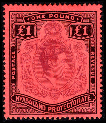 Nyasaland 1938-44 £1 purple and black on red lightly mounted mint. 