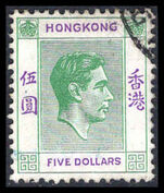 Hong Kong 1938-52 $5 green and violet fine used.
