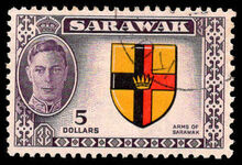 Sarawak 1950 $5 Arms fine used.