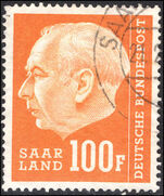 Saar 1957 100f yellow-orange fine used.